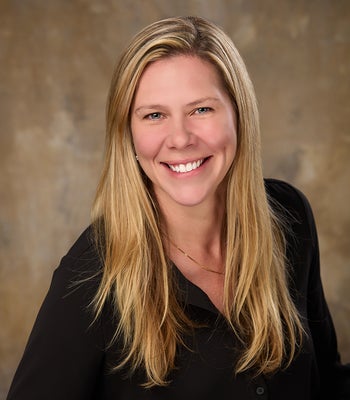 Portrait of Brenna Harrington, Realtor® , ABR, CNE, GREEN.