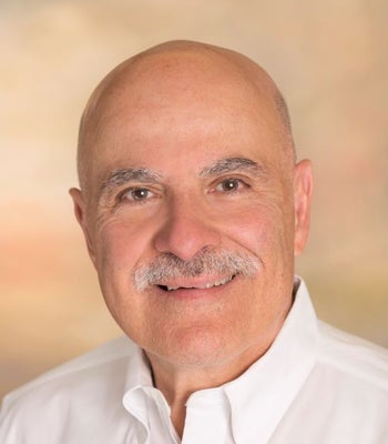 Portrait of Chris Fillios, Realtor®,   Associate Broker.