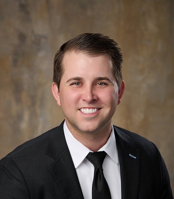 Portrait of Cody Funk, Realtor®.